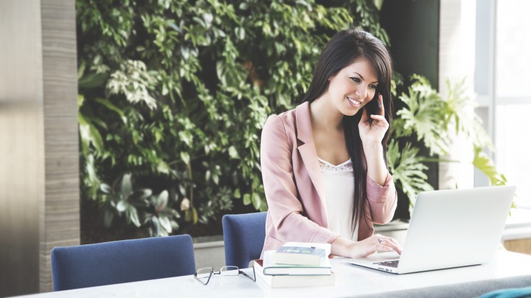 becoming a better listener for improved customer service woman on the phone image