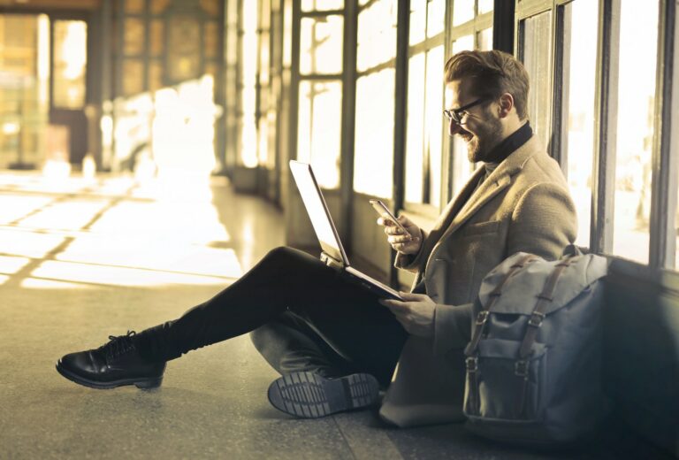 image of someone working on their laptop after following work productivity tips